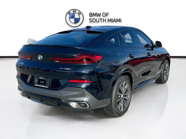 new 2025 BMW X6 car, priced at $77,875