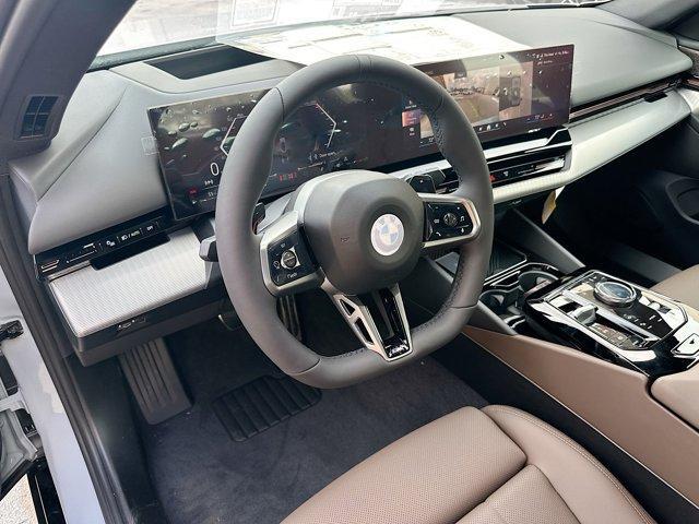 new 2025 BMW 530 car, priced at $67,135