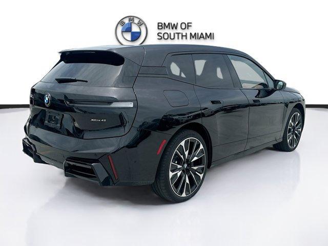 new 2026 BMW iX car, priced at $87,720