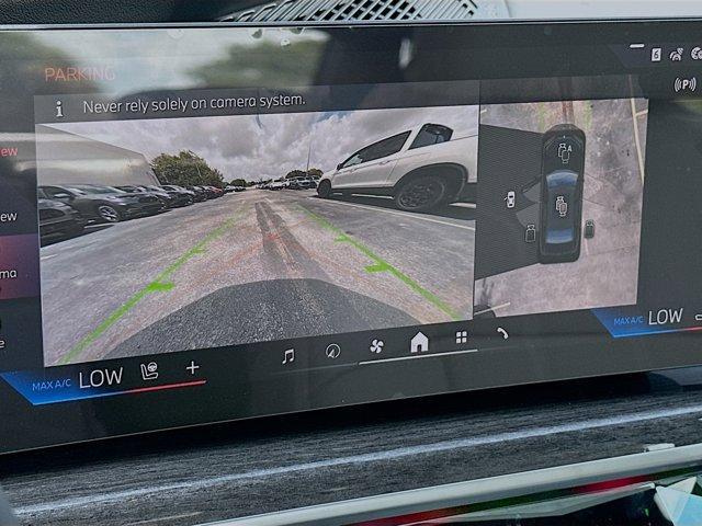 new 2025 BMW 740 car, priced at $107,611