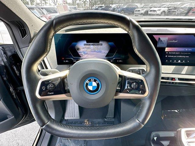 used 2024 BMW iX car, priced at $63,750