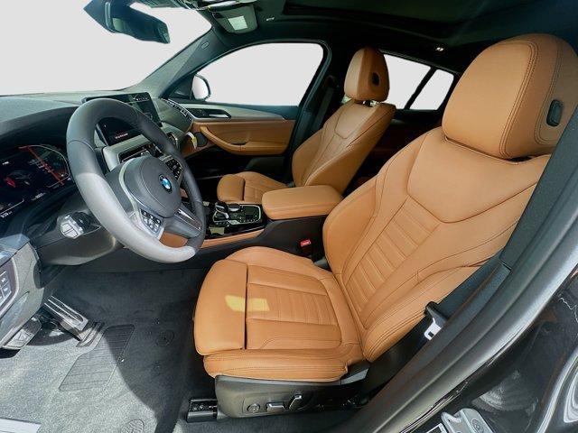 new 2025 BMW X4 car, priced at $69,015