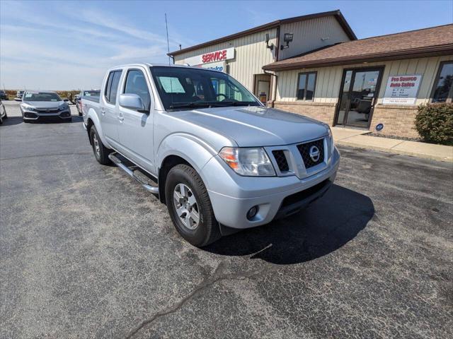 used 2010 Nissan Frontier car, priced at $10,987