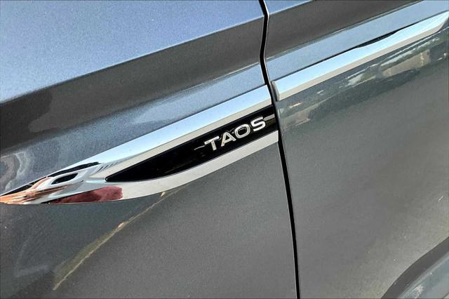 used 2022 Volkswagen Taos car, priced at $20,000