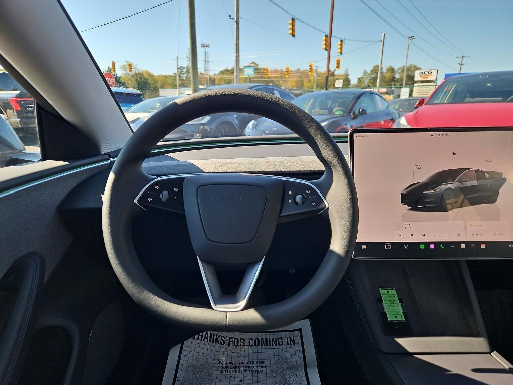 used 2025 Tesla Model 3 car, priced at $35,891