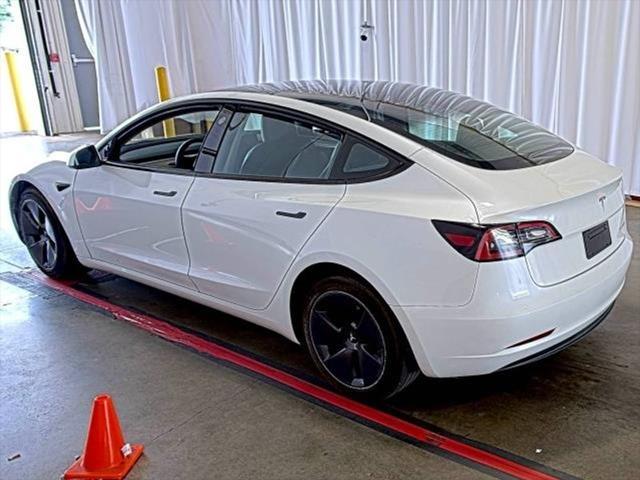 used 2023 Tesla Model 3 car, priced at $20,300