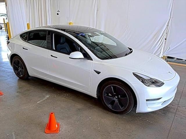used 2023 Tesla Model 3 car, priced at $20,300