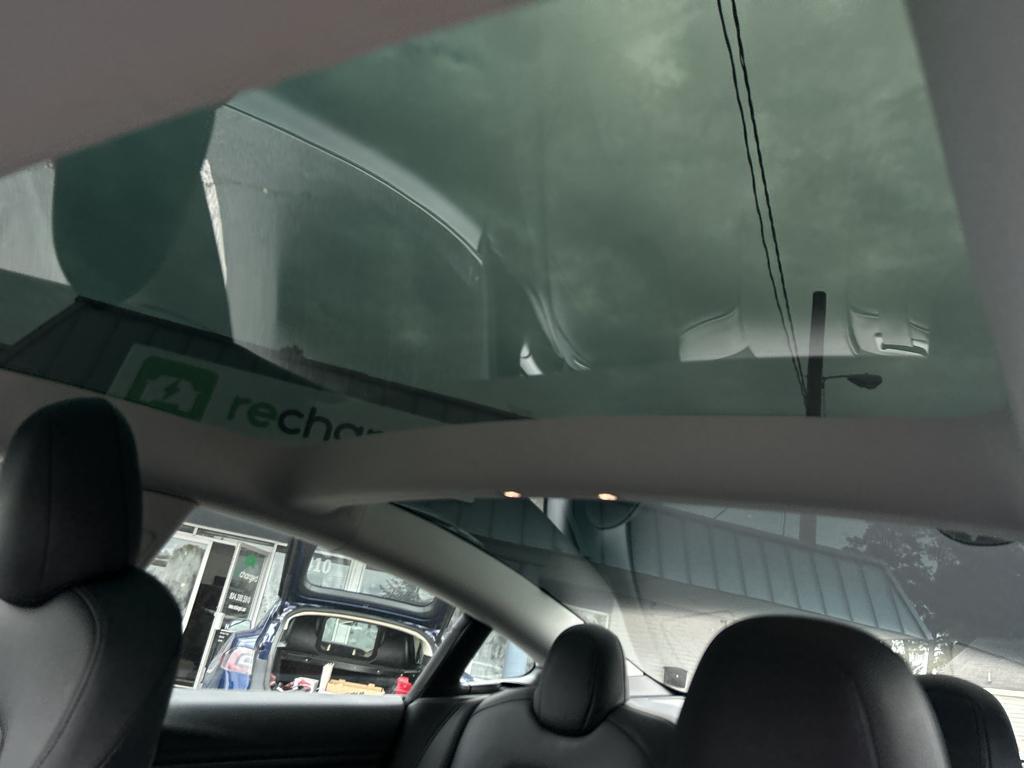 used 2023 Tesla Model 3 car, priced at $31,699