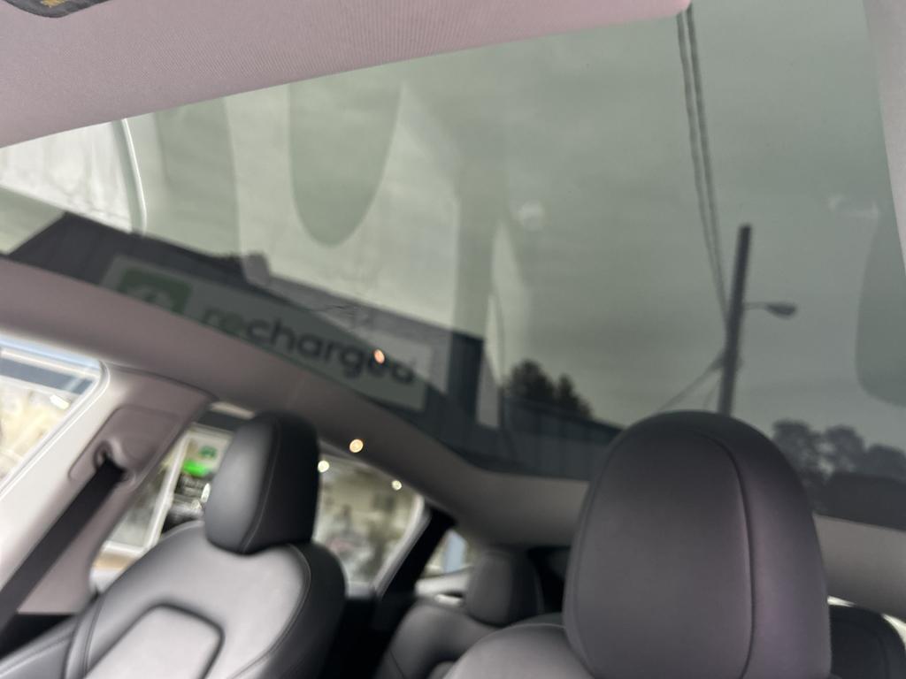 used 2024 Tesla Model Y car, priced at $32,599