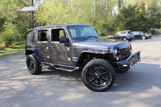 used 2014 Jeep Wrangler Unlimited car, priced at $15,500