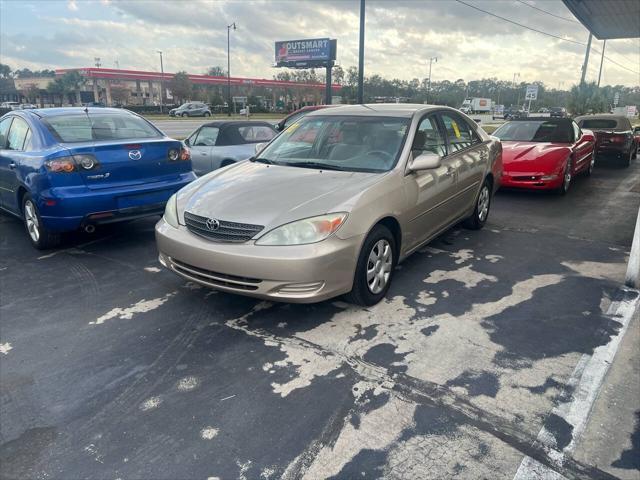 used 2004 Toyota Camry car, priced at $6,488