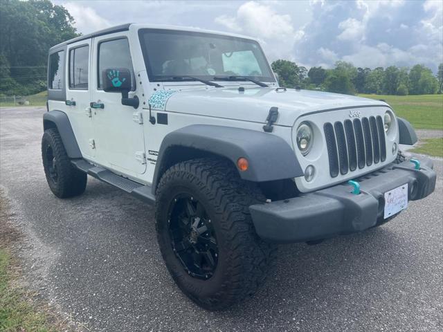 used 2015 Jeep Wrangler car, priced at $17,259