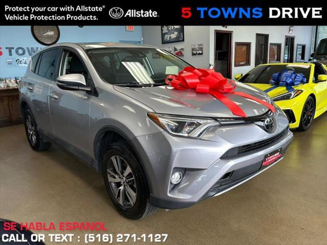 used 2018 Toyota RAV4 car, priced at $17,995