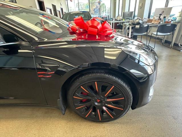 used 2021 Tesla Model 3 car, priced at $13,995