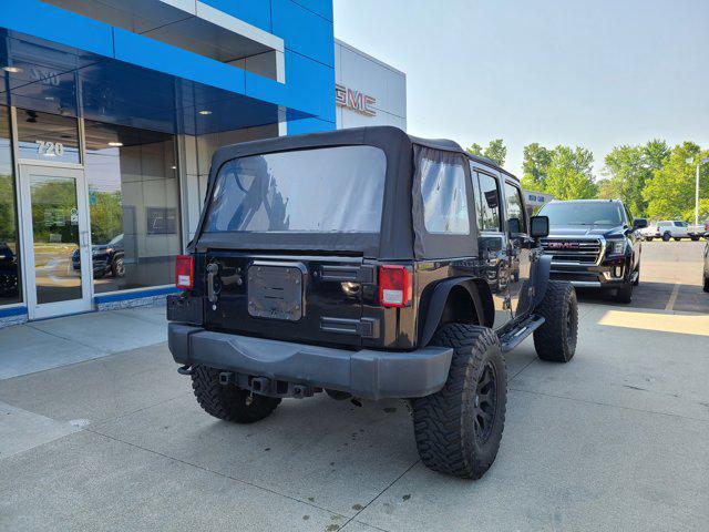 used 2015 Jeep Wrangler Unlimited car, priced at $23,456