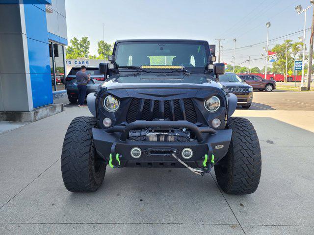 used 2015 Jeep Wrangler Unlimited car, priced at $23,456