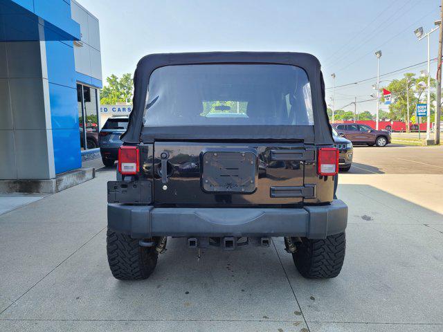 used 2015 Jeep Wrangler Unlimited car, priced at $23,456