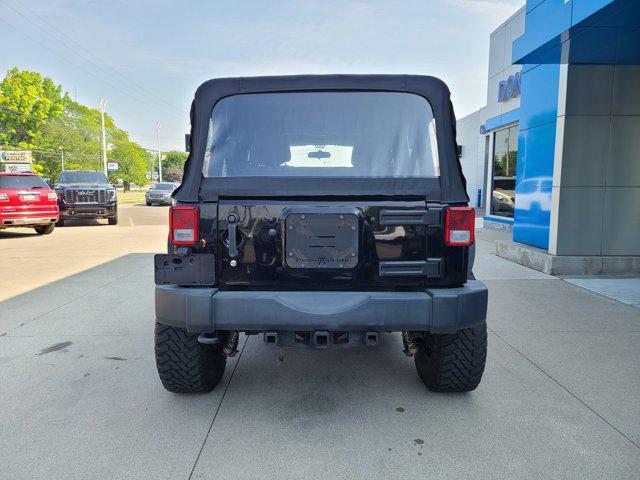 used 2015 Jeep Wrangler Unlimited car, priced at $23,456