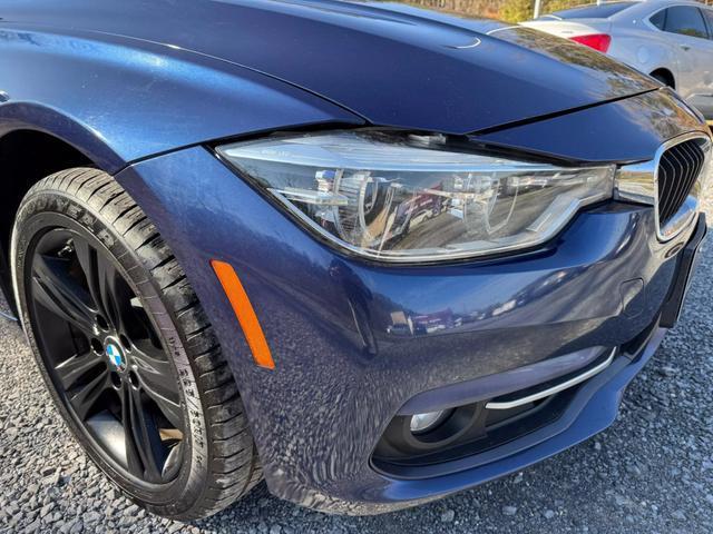 used 2018 BMW 330 car, priced at $13,595