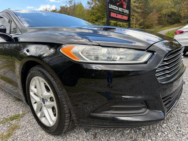 used 2016 Ford Fusion car, priced at $10,995