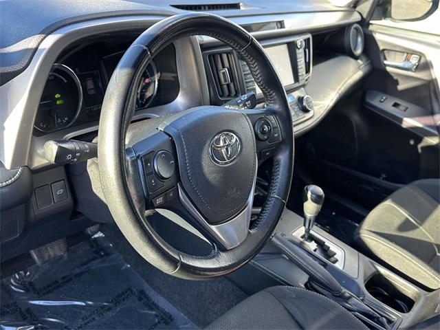 used 2018 Toyota RAV4 Hybrid car, priced at $16,400