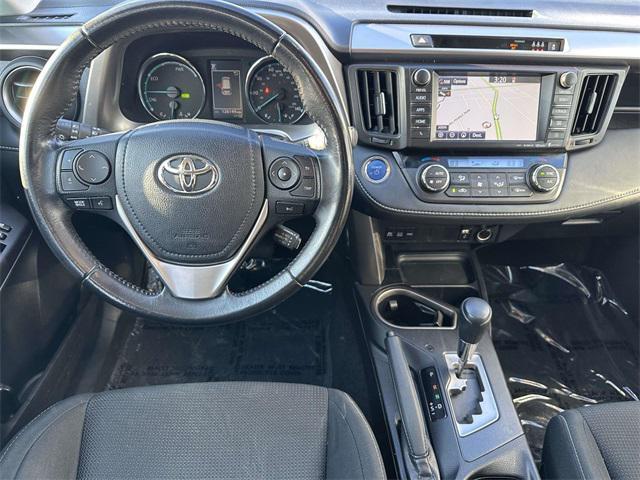 used 2018 Toyota RAV4 Hybrid car, priced at $16,400