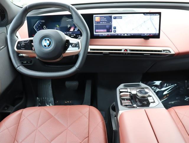 used 2024 BMW iX car, priced at $61,000