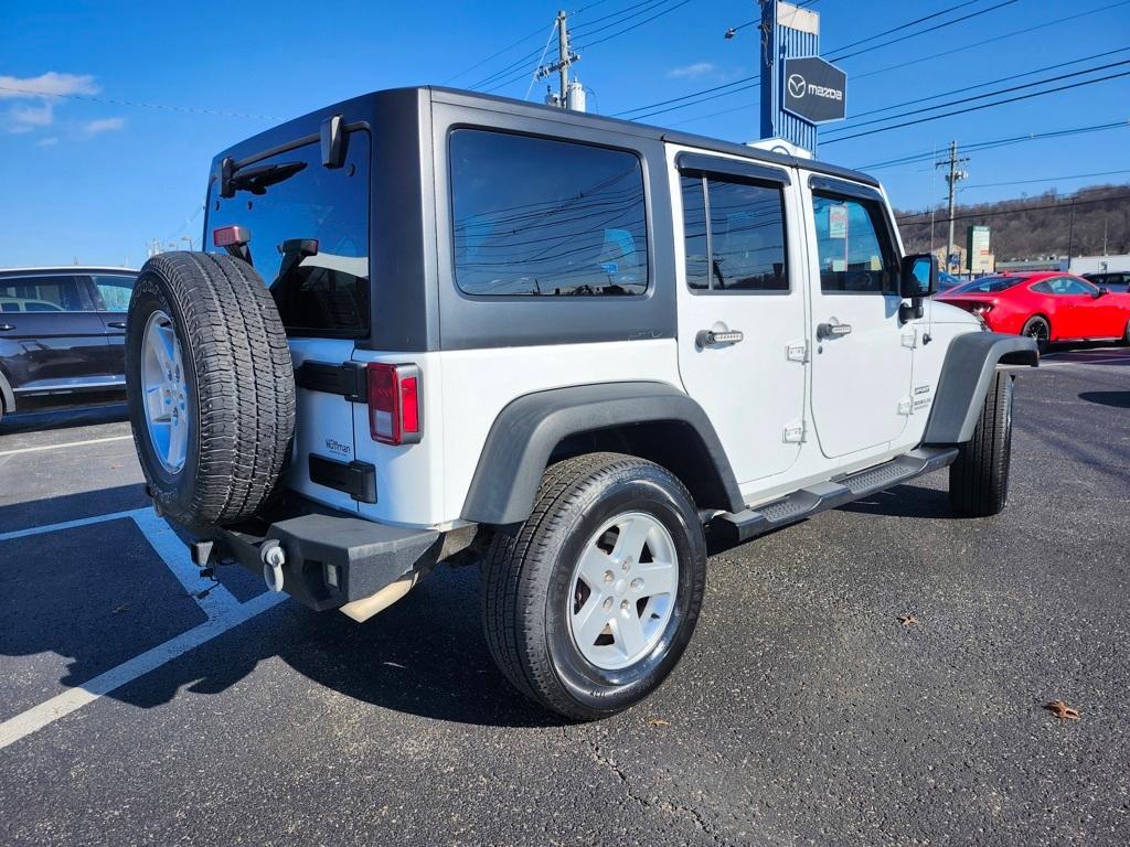 used 2015 Jeep Wrangler Unlimited car, priced at $13,915