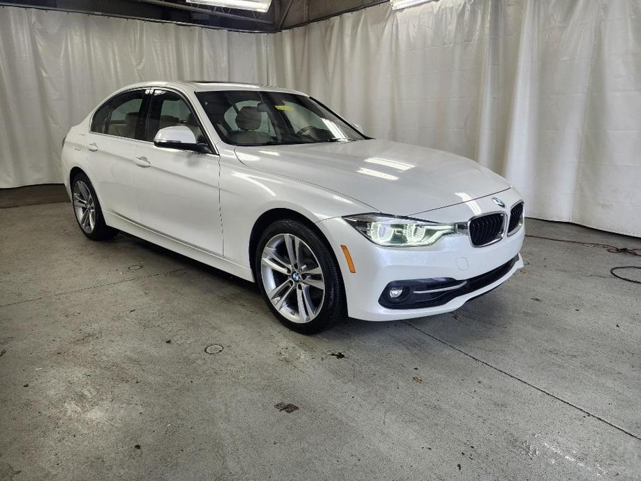 used 2018 BMW 330 car, priced at $24,490