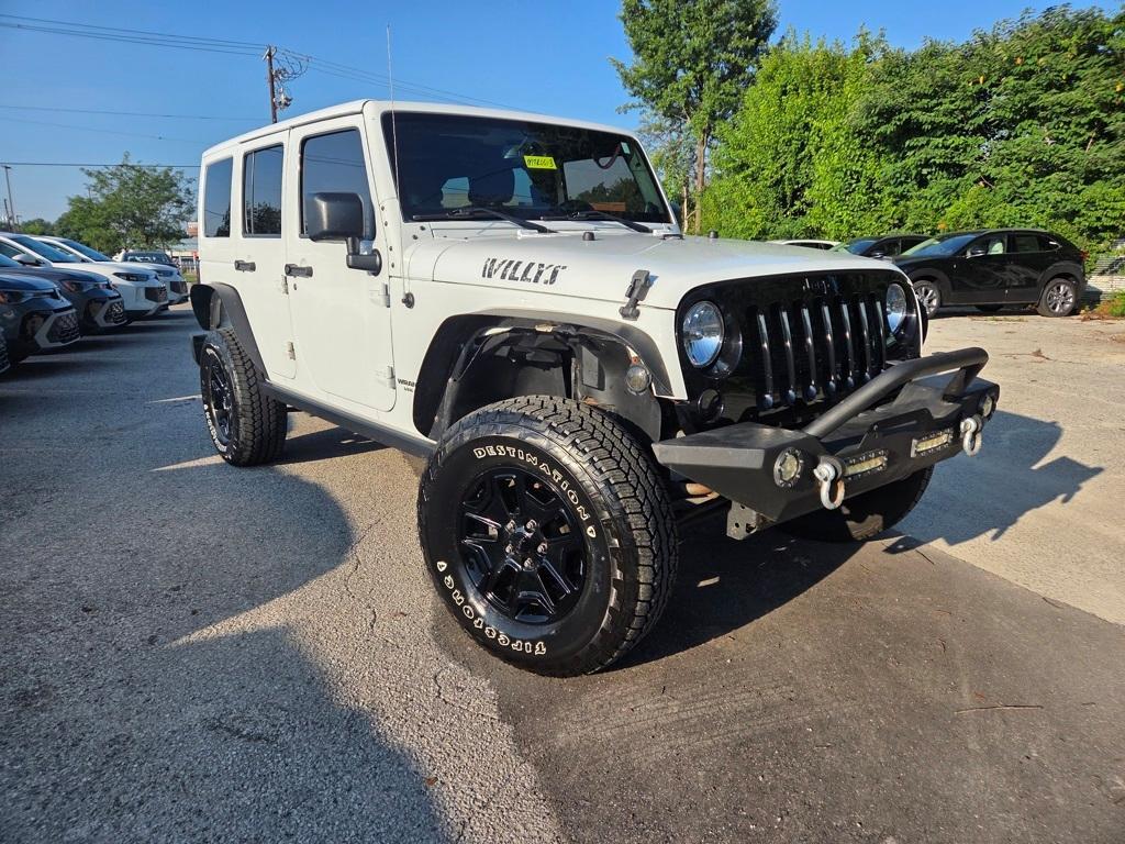 used 2014 Jeep Wrangler Unlimited car, priced at $21,493