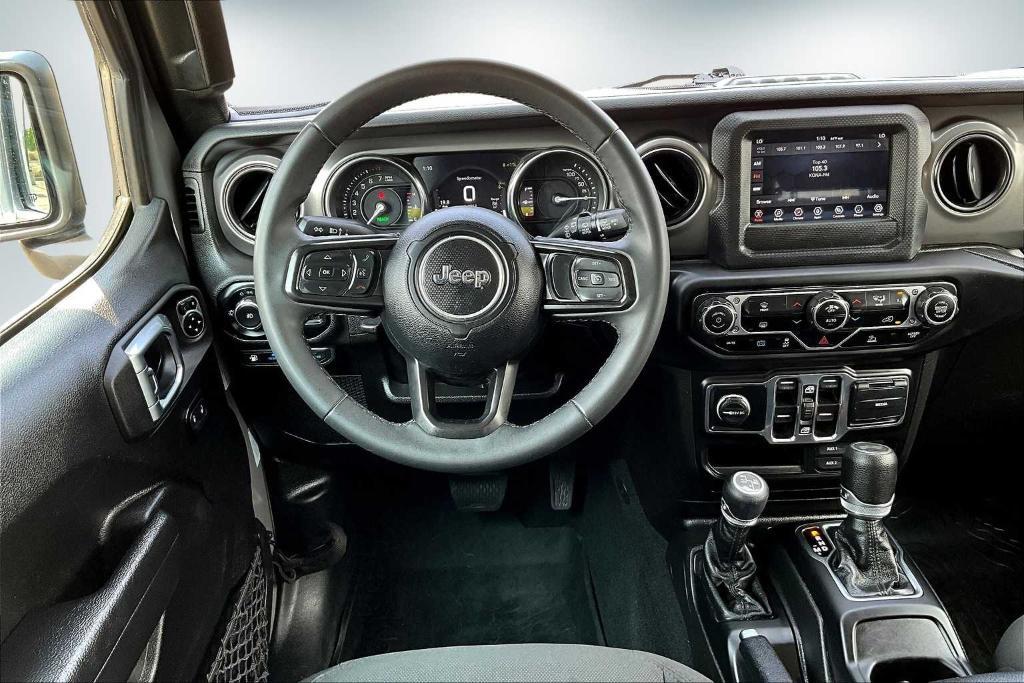 used 2023 Jeep Wrangler 4xe car, priced at $28,488