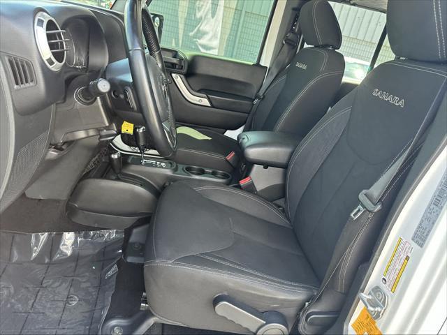 used 2018 Jeep Wrangler JK Unlimited car, priced at $22,999