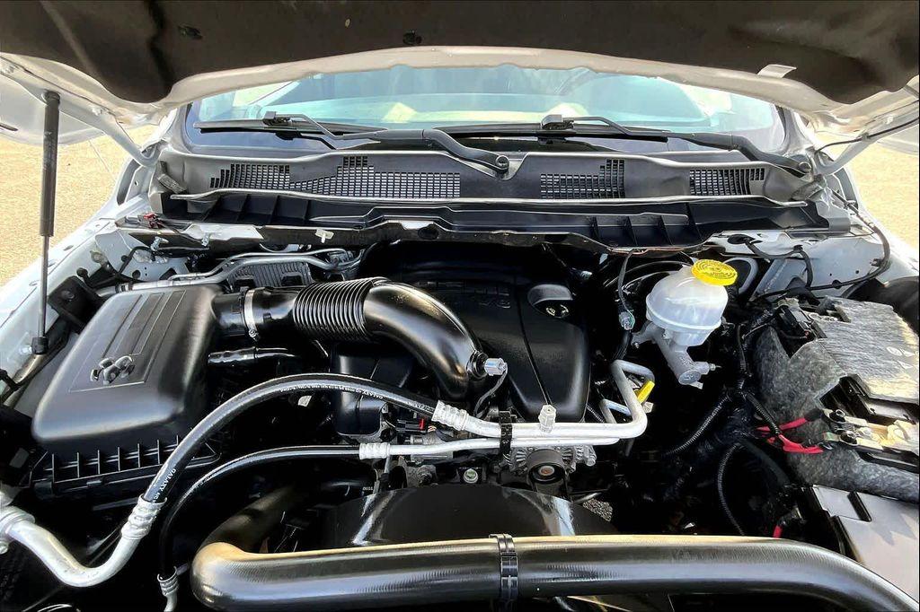 used 2018 Ram 1500 car, priced at $26,488