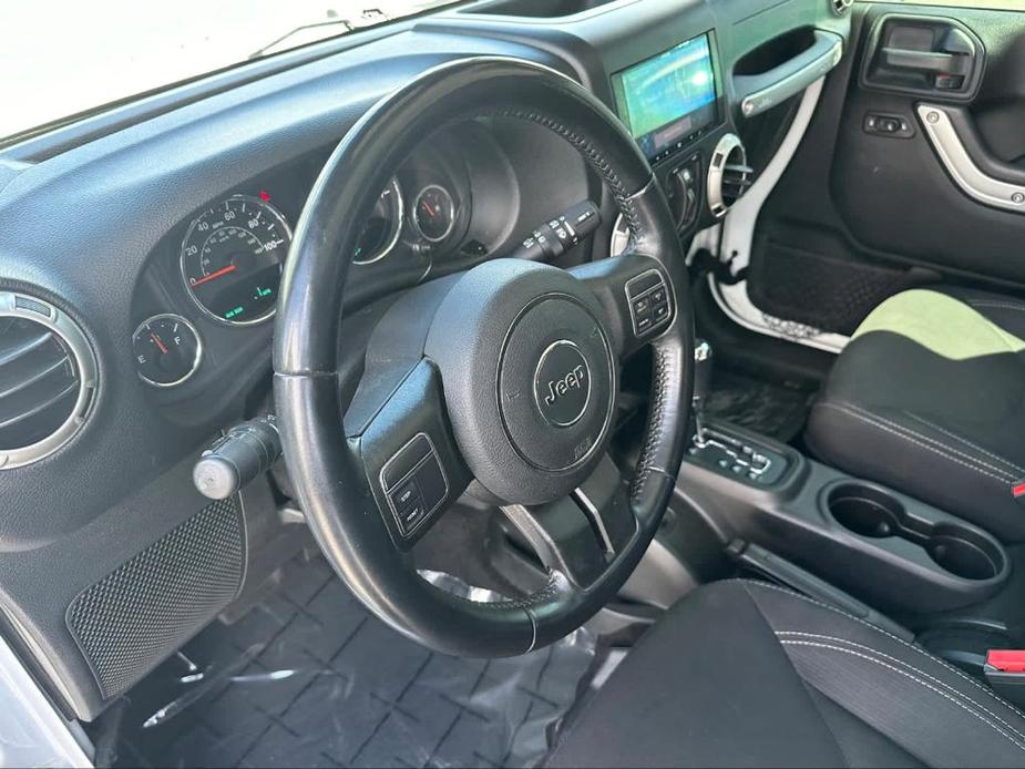 used 2018 Jeep Wrangler JK Unlimited car, priced at $23,899