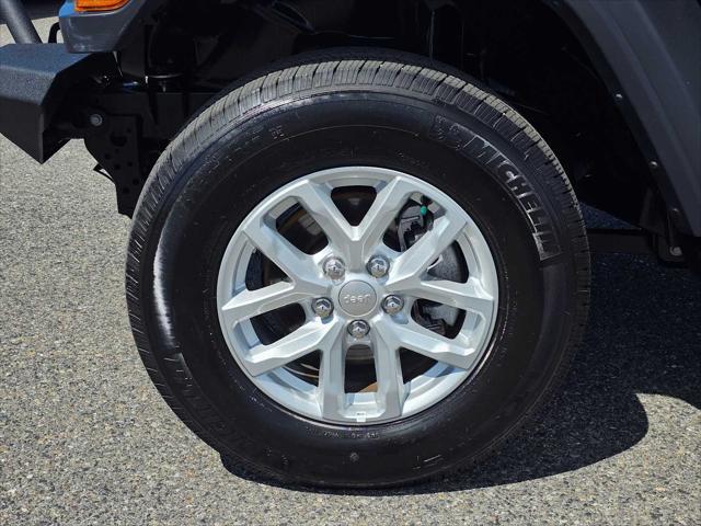 used 2023 Jeep Wrangler car, priced at $33,999