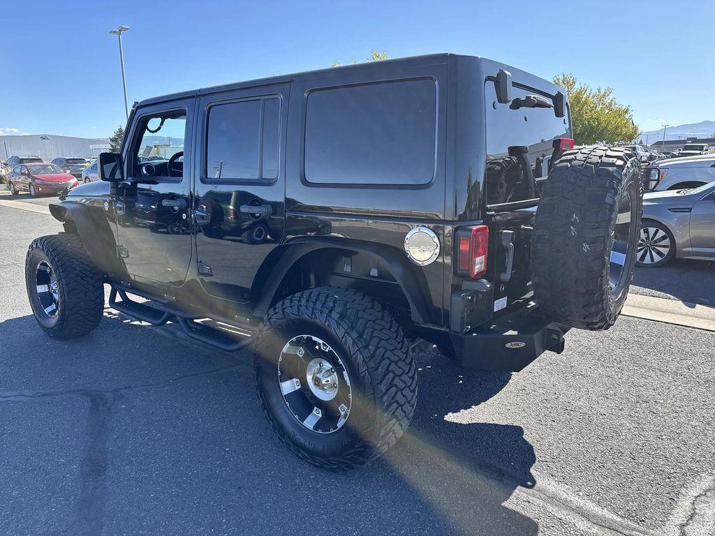 used 2012 Jeep Wrangler Unlimited car, priced at $16,399