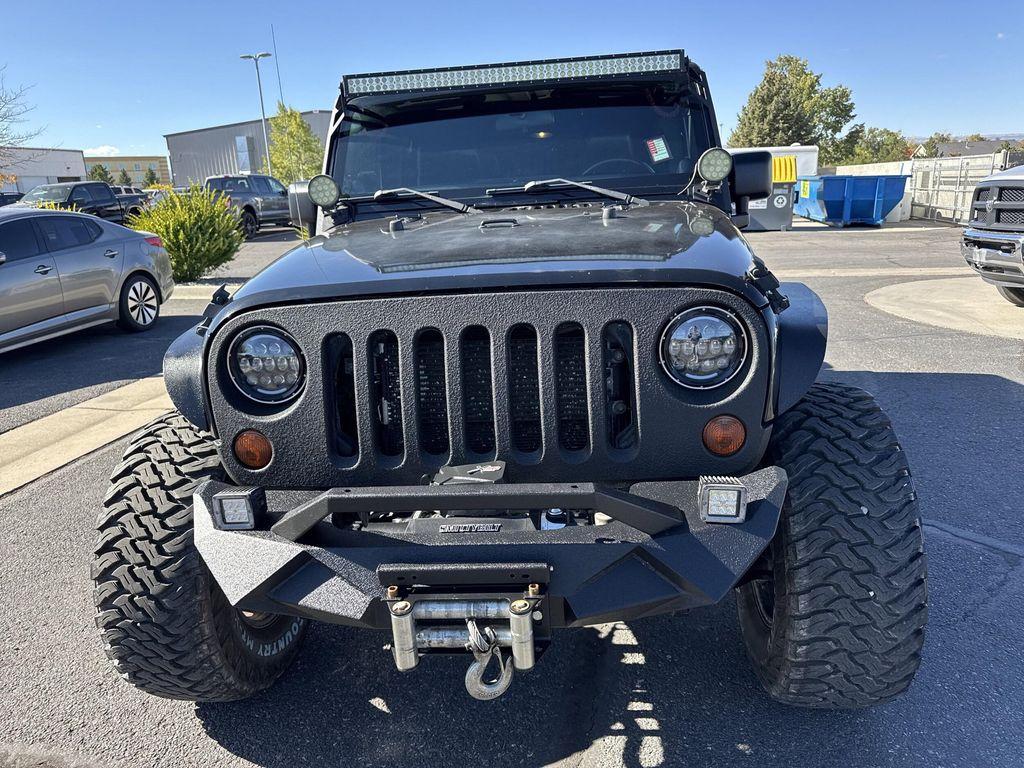 used 2012 Jeep Wrangler Unlimited car, priced at $16,399