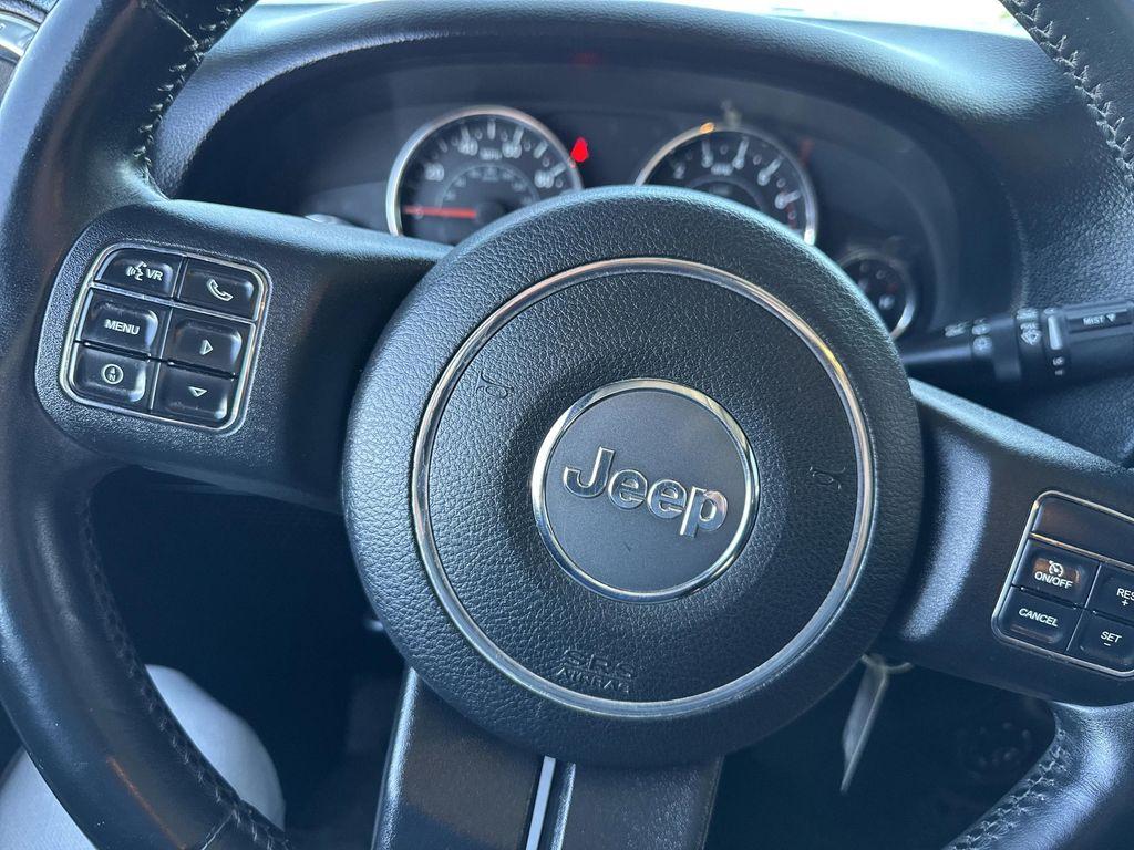 used 2012 Jeep Wrangler Unlimited car, priced at $16,399
