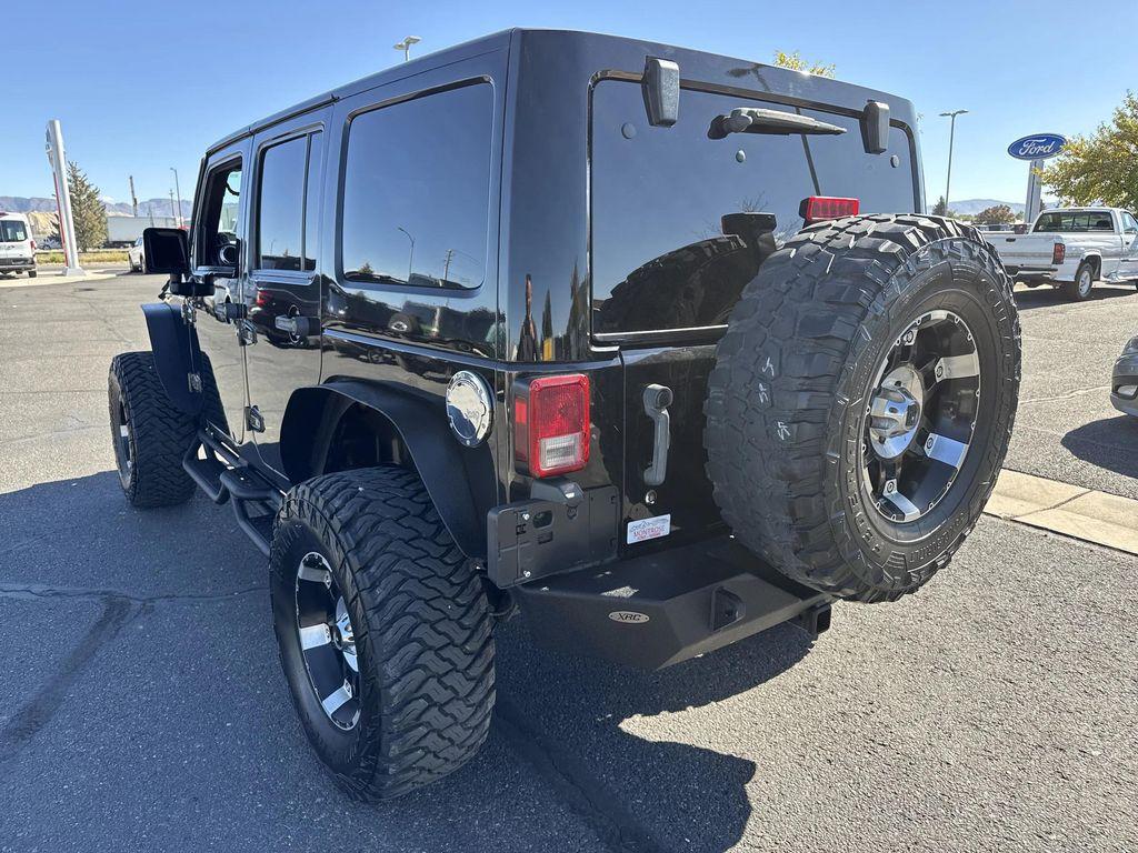 used 2012 Jeep Wrangler Unlimited car, priced at $16,399