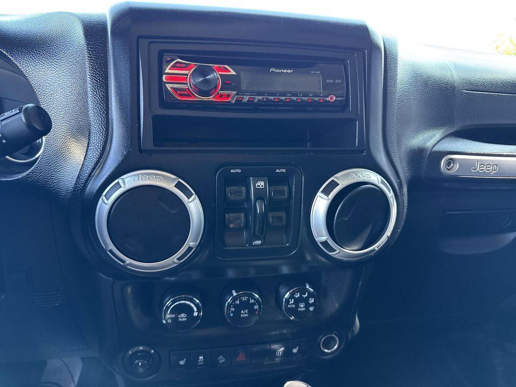 used 2012 Jeep Wrangler Unlimited car, priced at $16,399