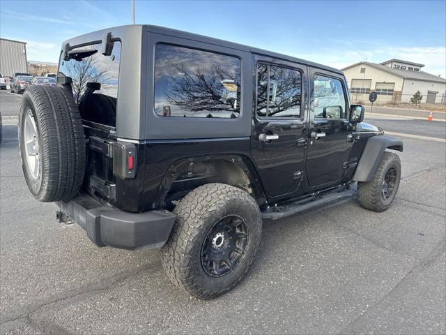 used 2014 Jeep Wrangler Unlimited car, priced at $12,399