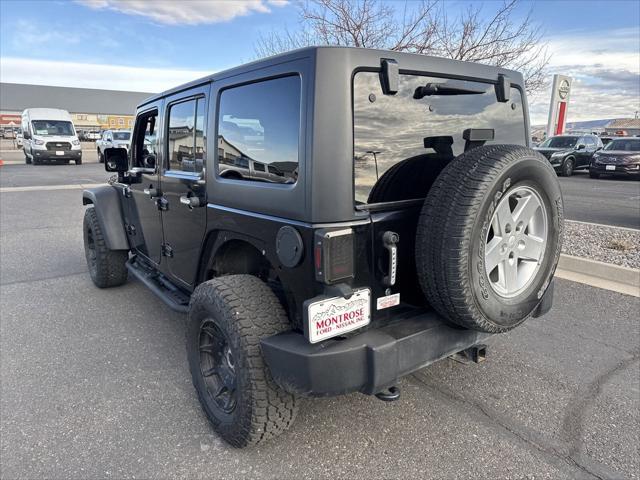 used 2014 Jeep Wrangler Unlimited car, priced at $12,399