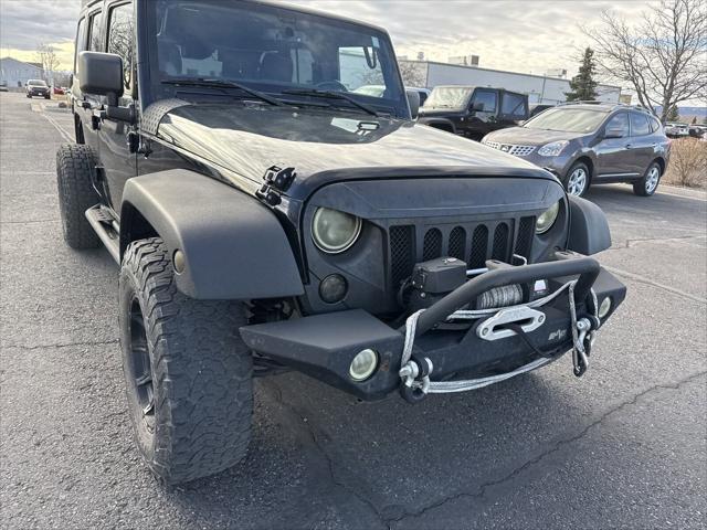 used 2014 Jeep Wrangler Unlimited car, priced at $12,399