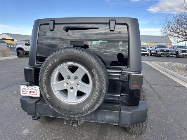 used 2014 Jeep Wrangler Unlimited car, priced at $12,399