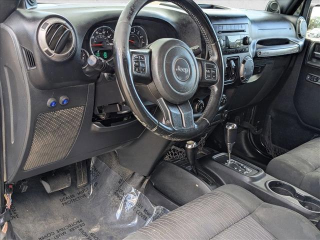 used 2012 Jeep Wrangler Unlimited car, priced at $11,529