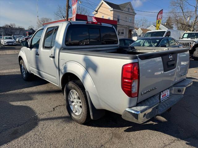 used 2014 Nissan Frontier car, priced at $15,999