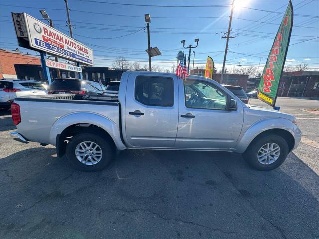 used 2014 Nissan Frontier car, priced at $15,999