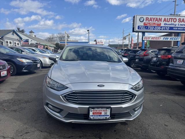 used 2018 Ford Fusion car, priced at $12,999