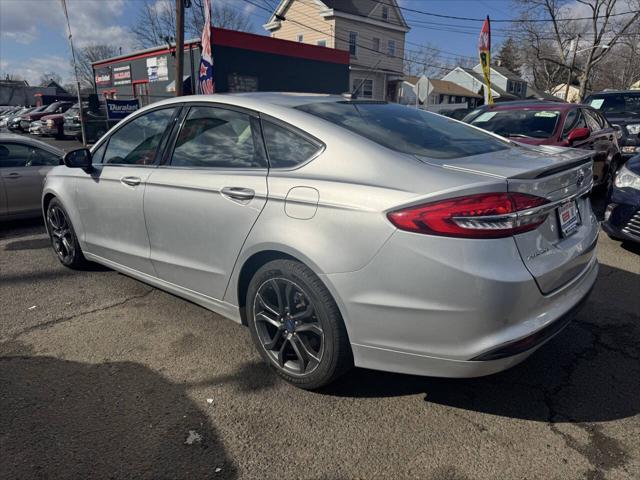 used 2018 Ford Fusion car, priced at $12,999