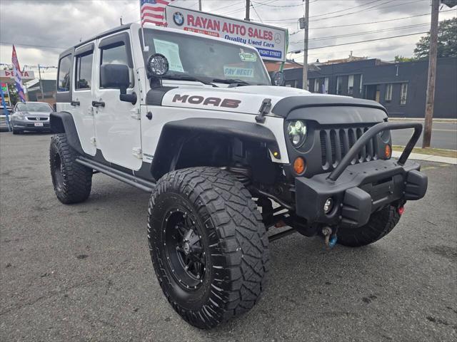 used 2013 Jeep Wrangler Unlimited car, priced at $17,999